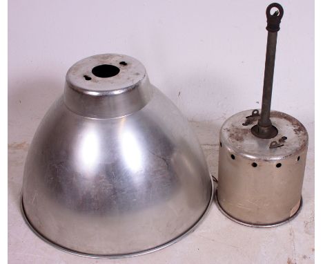 A vintage 20th century aluminium  factory Industrial pendant light oversized shade with bracket atop