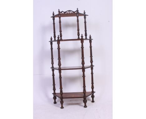 A Victorian mahogany whatnot corner shelf, each tier supported by turned supports, with inlaid decoration to each level. H135