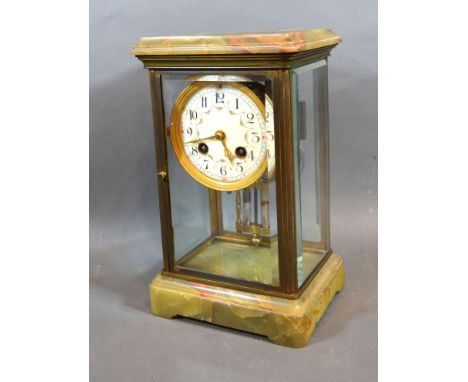 A French Onyx and Brass Cased Library Clock, the enamel dial with Roman numerals and two train movement striking on a gong, 2