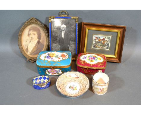 An Enamel Cup and Saucer hand painted with reserves together with two Limoges small caskets, an oval pill box and three minia