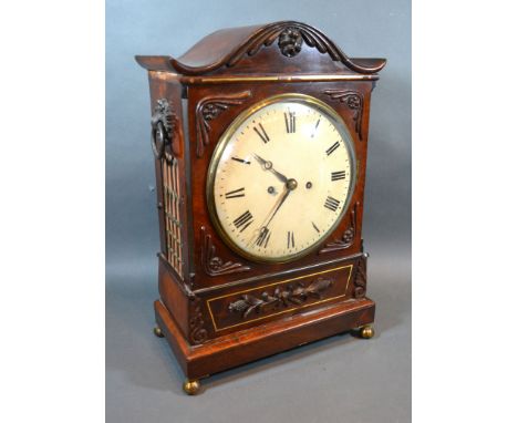 A William IV Mahogany Bracket Clock, the circular dial with Roman numerals and with twin fusee movement, the case with side h