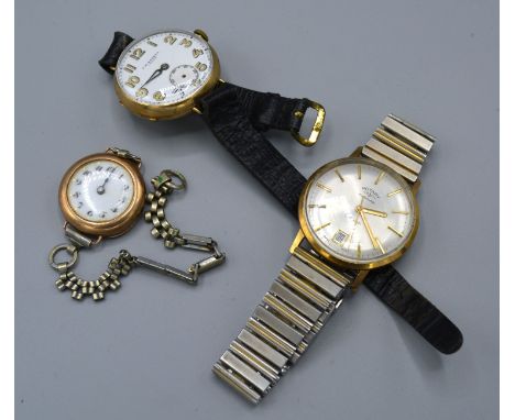 A 9ct. Gold Cased Rotary Gentleman's Wrist Watch together with a 9ct. gold cased wrist watch by J.W. Benson and a ladies 9ct.