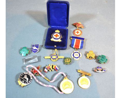 A Collection of Enamel Set Badges and Medallions 