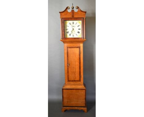 A 19th Century Oak and Mahogany Long Case Clock, the square hood with swan neck pediment and brass finial and with turned pil