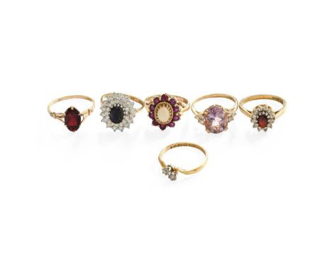 An 18 Carat Gold Diamond Two Stone Twist Ring, finger size O; Four 9 Carat Gold Rings, comprising a ruby and opal cluster, fi