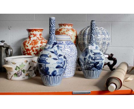 Decorative 20th Century Chinese Ceramics, including a pair of blue and white bottle vases, two jars and covers, a small twin-