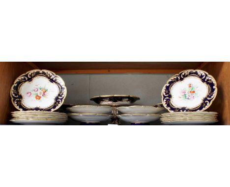 A Victorian Floral-Painted Dessert Service, with gilt and cobalt blue borders, comprising: cake stands of varying heights and
