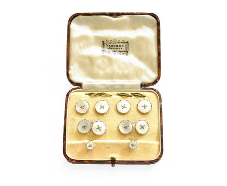 A Mother-of-Pearl Cufflink. Dress Stud and Button Suite, comprising of two studs, four buttons and a pair of chain linked cuf