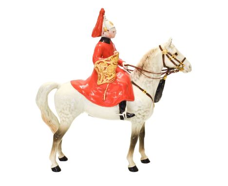 Beswick Lifeguard, model No. 1642, light dapple grey glossThere is fine crazing throughout and glue residue around the bit bu