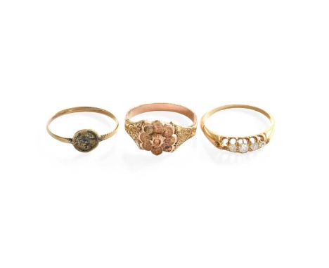A Small Quanitiy of Jewellery, comprising of a diamond ring (one stone deficient) stamped '18', finger size M; a flower ring,
