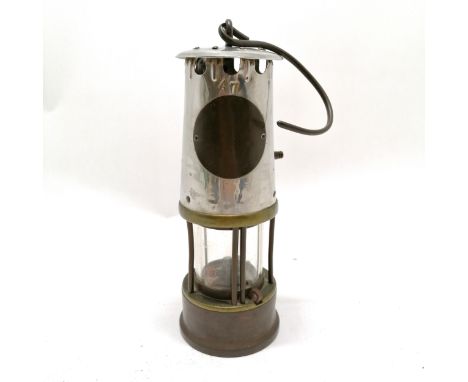 Eccles miner's Lamp (Davy) of chromed finish and brass, No 52/ 820 R, 25 cm high. Has old solder repairs mostly to the base, 