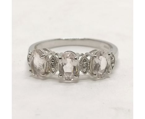 9ct hallmarked white gold 3 x oval white stone ring (with 4 diamonds set between) - size N½ &amp; 2.2g total weight 