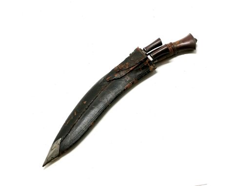 Nepalese Kukri : A turned hardwood and brass handled military knife leather with the two skinning knives all within a leather