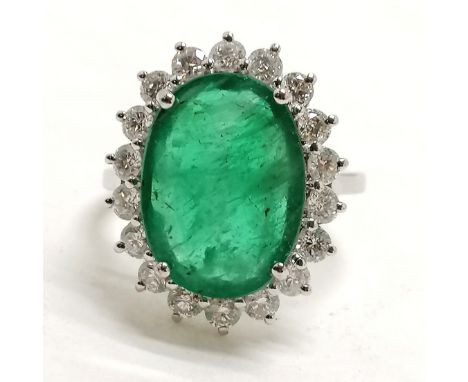 18ct marked white gold emerald (approx 15mm x 10.5mm) &amp; diamond cluster ring - size N½ &amp;  5.9g total weight 