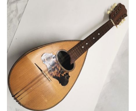 'Carlo Ricordo, Napoli': a mandolin, with Mother-of-Pearl and tortoiseshell inlay with 5 of the 8 string facility. 60 cm long