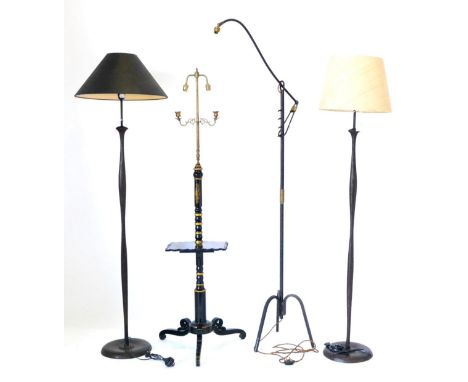 A Regency Style Ebonised and Mother-of-Pearl Standard Lamp, with two brass candle arms and two bayonet caps fitted for electr