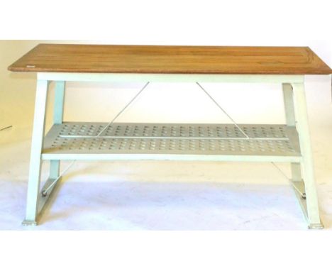 An Oak and Green Painted Folding Table, the rectangular top above trestle end supports, the pierced shelf with metal adjustab