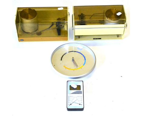 Two Castella Barographs; An LCD Barometer; A Circular Wall Mounted Barometer; A Model of an Air France Constellation; and Fiv