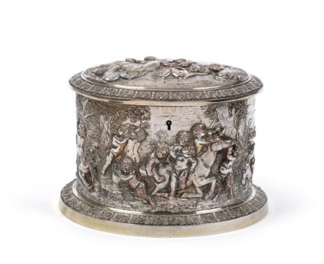 A Victorian Silver on Copper Tea Caddy, oval, the exterior profusely decorated with Bacchanal in a landscape, the hinged cove