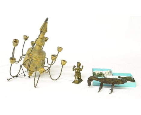 Three Roman Style Bronze Fittings, 8cm long; A Similar Bronze Fitting, as a bird; A South East Asian Weight, as a figure ridi