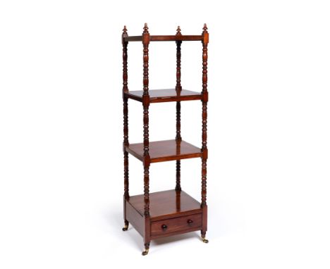 An Early Victorian Mahogany Whatnot, of four square tiers on ring and baluster turned supports, with a drawer to the base, on