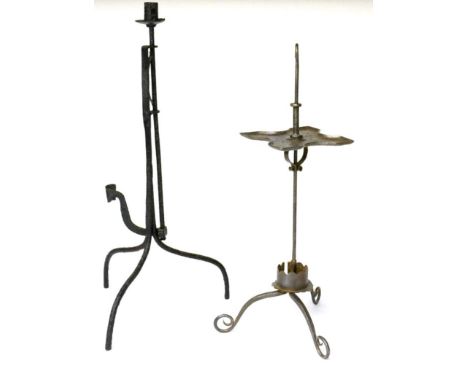 A Wrought Iron Candle Holder, 19th century, with hook finial over an adjustable quatrefoil plateau on tripod base, 53cm high;