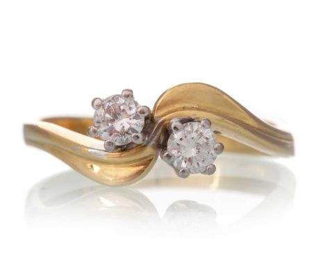 DIAMOND TWO STONE RING, the round brilliant cut diamonds totalling approximately 0.30 carats, in eighteen carat gold, size MQ