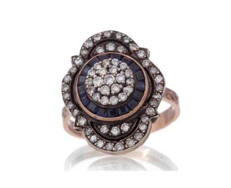 SAPPHIRE AND DIAMOND DRESS RING, the diamonds totalling approximately 0.75 carats, unmarked, size O