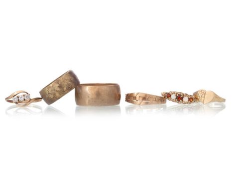 SIX NINE CARAT GOLD RINGS, including a garnet and opal example and a gem set exampleQty: 15.7g
