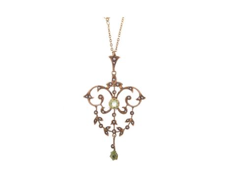 EDWARDIAN PERIDOT AND SEED PEARL HOLBEIN PENDANT, of openwork form, in nine carat gold, on a modern chain