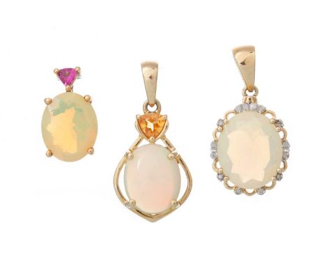 THREE ETHIOPIAN OPAL PENDANTS, each in nine carat goldQty: 5.7g grossEach lightly worn