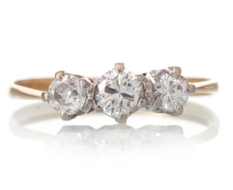 DIAMOND THREE STONE RING, the round brilliant cut diamonds totalling approximately 0.80 carats, unmarked, size TQty: 1.8g0.90