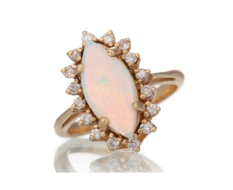 OPAL AND DIAMOND RING,  set with a marquise cabochon opal, within a diamond halo, marked 14KQty: 4.8g