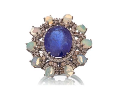 TANZANITE, OPAL AND DIAMOND RING, set with central tanzanite surrounded by diamonds totalling approximately 0.80 carats, and 