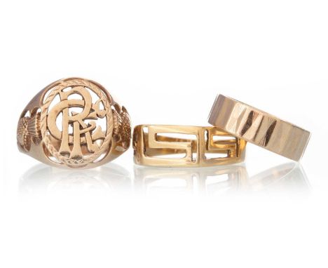 THREE GOLD RINGS, comprising a Rangers FC crest ring along with a wedding band and a Greek key ring, two in nine carat gold a