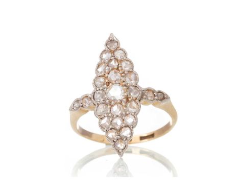 DIAMOND NAVETTE RING, set with rose cut diamonds totalling very approximately 1.20 carats, in eighteen carat gold, size OQty: