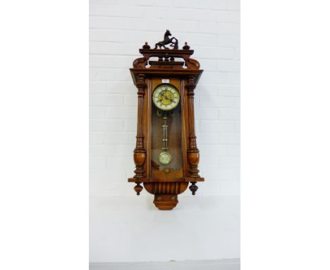 A Vienna mahogany cased wall clock