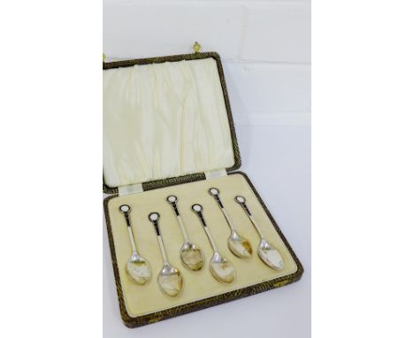 An Art Deco cased set of six silver and black and white enamel teaspoons with makers mark for William Suckling Ltd, Birmingha