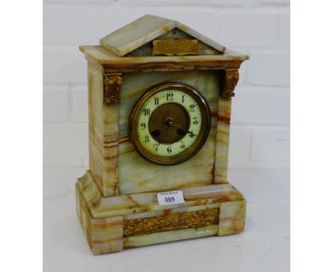 A late 19th century white hardstone clock of architectural form with Arabic numerals to the dial, 32cm high