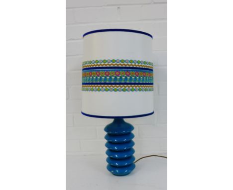 A retro turquoise hard plastic table lamp base and shade