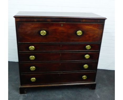 A 19th century mahogany secretaire chest, the fall front opening to reveal a fitted interior over four graduating long drawer