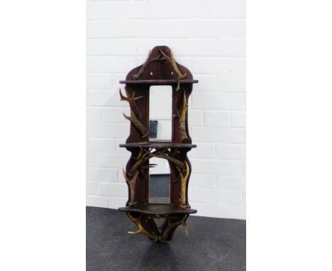 A corner wall shelf with mirror back and horn antlers, 82 x 30cm  From the residual contents of a West Coast Family Country H