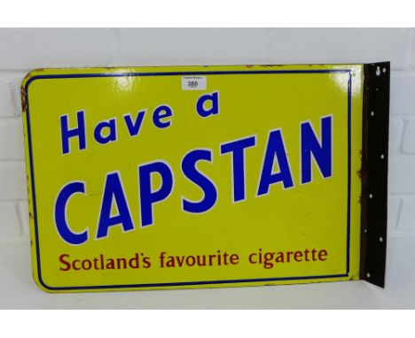 A vintage enamel sign 'Have a Capstan, Scotland's favourite Cigarette', double sided, 35 x 56cm