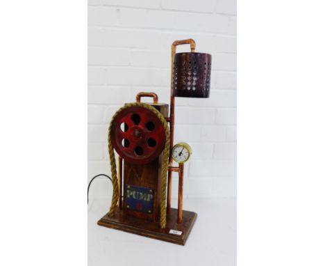 A pump novelty table lamp