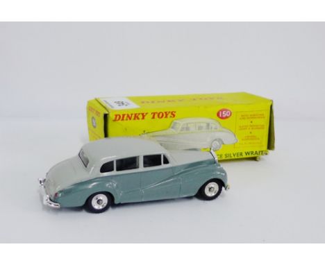 A Dinky Rolls Royce Silver Wraith model car complete with box
