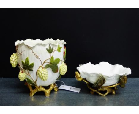 A Moore's floral and leaf encrusted porcelain planter, together with a Moore's white glazed bowl applied with gilt leaves and