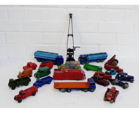 A quantity of vintage die cast cars and trucks etc., to include Dinky, etc., (a lot) 