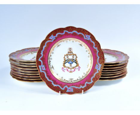 Set of eighteen John Ridgway & Co armorial dinner plates 19th Century each with painted coat of arms with motto Ora Et Labora