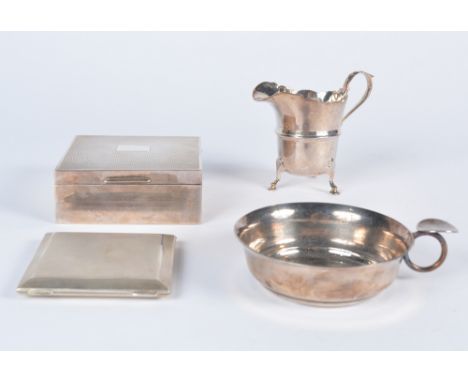 A small collection of miscellaneous including a tastevin, a small silver cream jug, a silver compact with engine turned decor