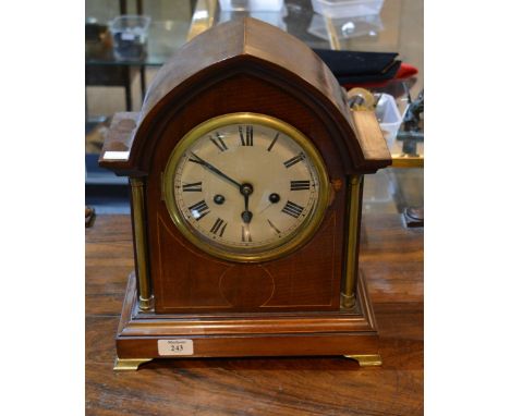 An Edwardian mahogany inlaid mantel clock with striking mechanism, 36cm